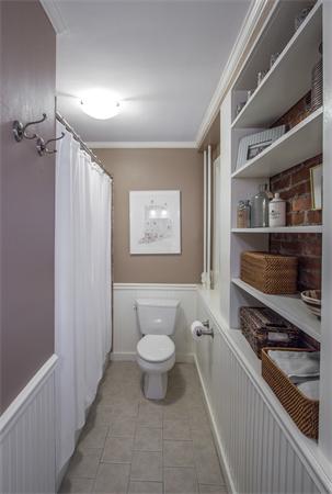9 Joy Street, Unit 3 Boston, MA 02114 - Photo 13 of 16 a bathroom with a toilet a sink and a shower