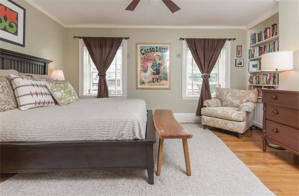 9 Joy Street, Unit 3 Boston, MA 02114 - Photo 9 of 16 a bedroom with a bed and a couch