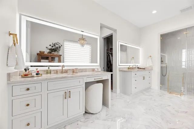 a spacious bedroom with a bed and a large window