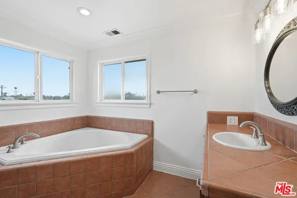 a bathroom with bathtub