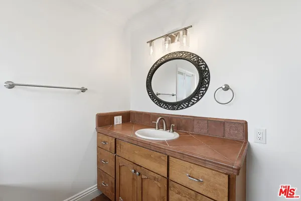 a bathroom with a tub and shower