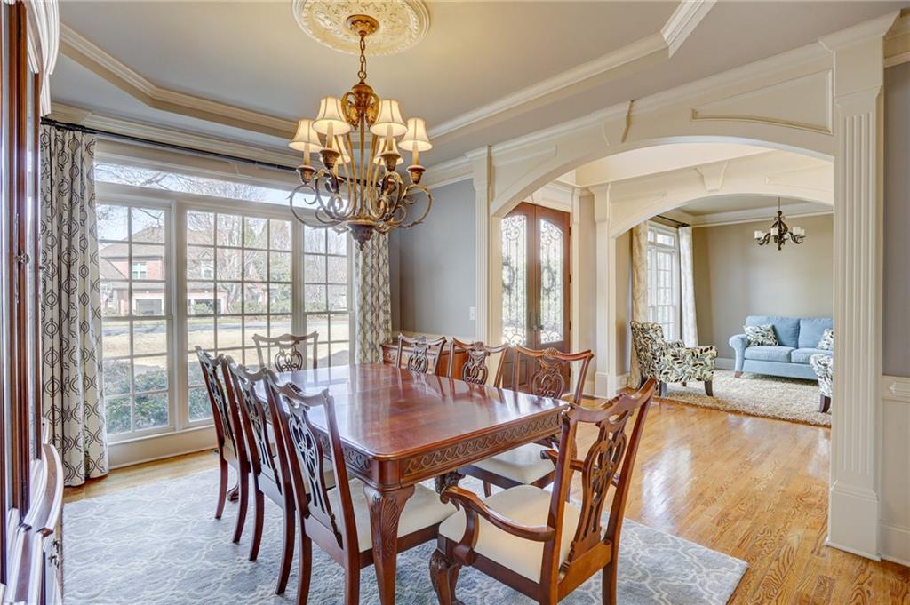 11015 Callington Court Suwanee, GA 30024 - Photo 17 of 87 a view of a dining room with furniture window and outside view