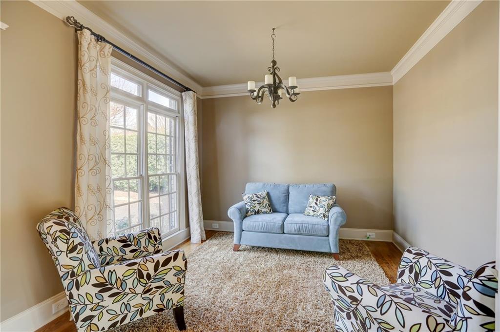 11015 Callington Court Suwanee, GA 30024 - Photo 18 of 87 a living room with furniture and two windows