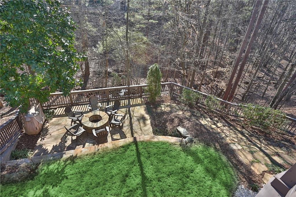 11015 Callington Court Suwanee, GA 30024 - Photo 37 of 87 a view of a yard with iron fence