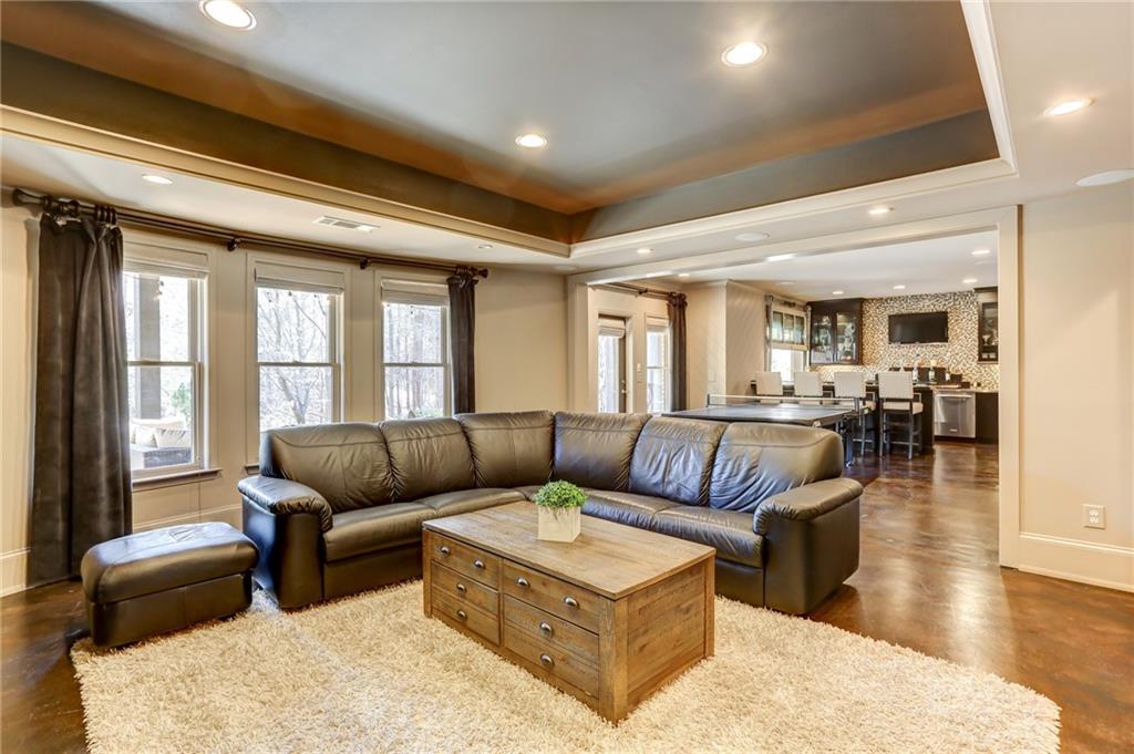 11015 Callington Court Suwanee, GA 30024 - Photo 61 of 87 a living room with furniture and a large window