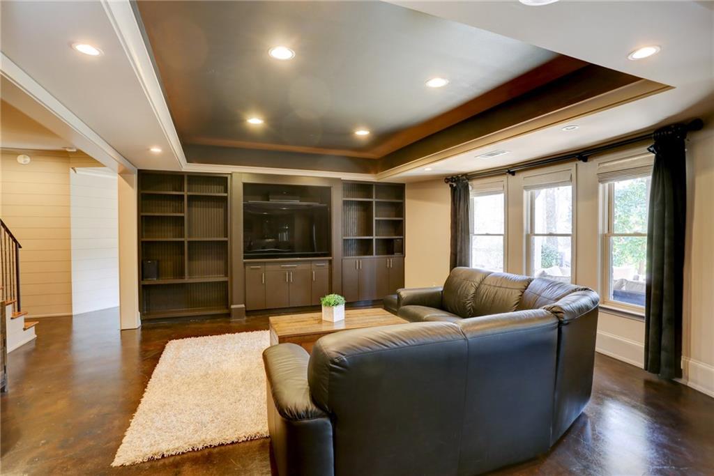 11015 Callington Court Suwanee, GA 30024 - Photo 66 of 87 a bedroom with furniture and a large window