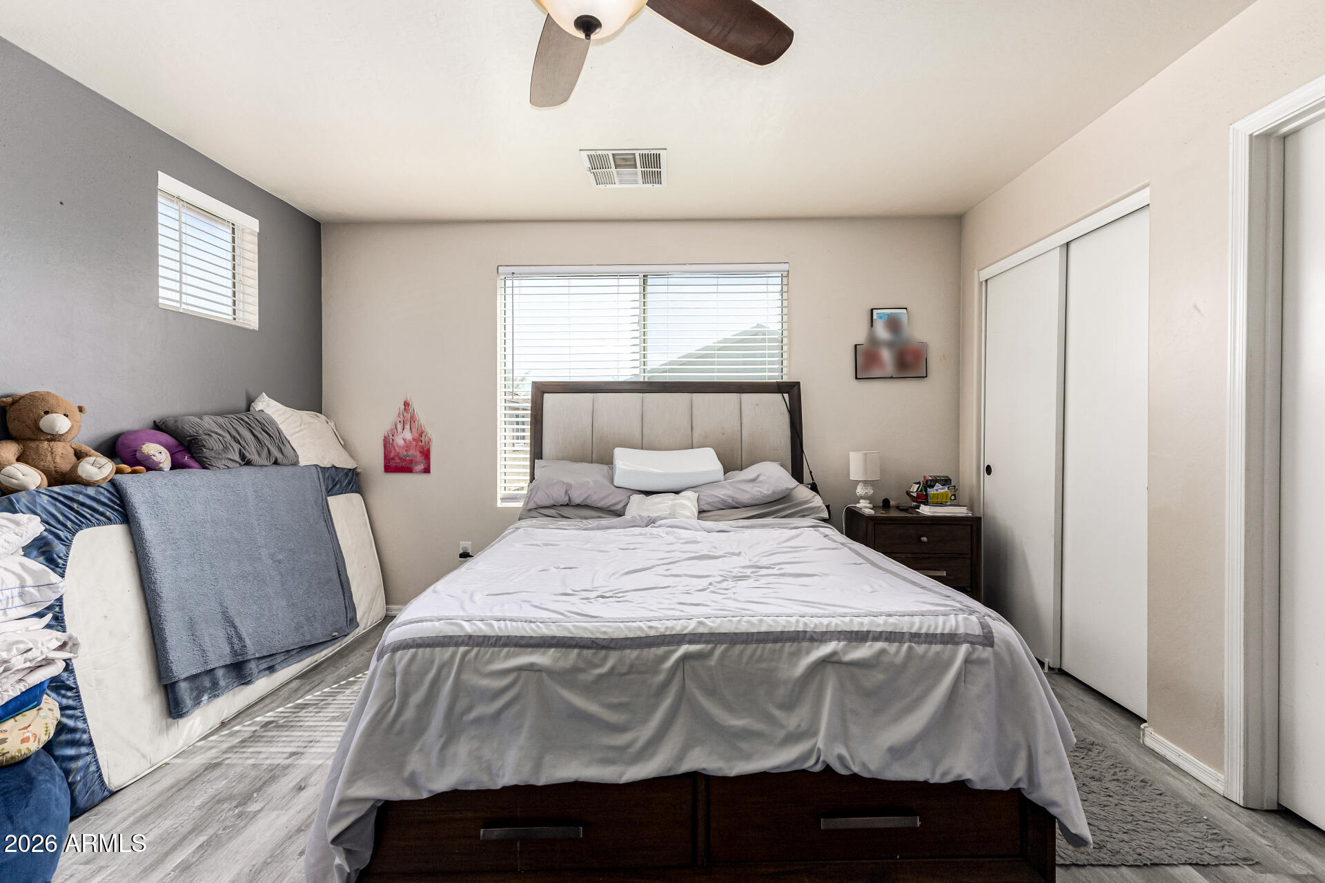4237 East Orchid Lane Gilbert, AZ 85296 - Photo 20 of 33 a bedroom with a bed and window
