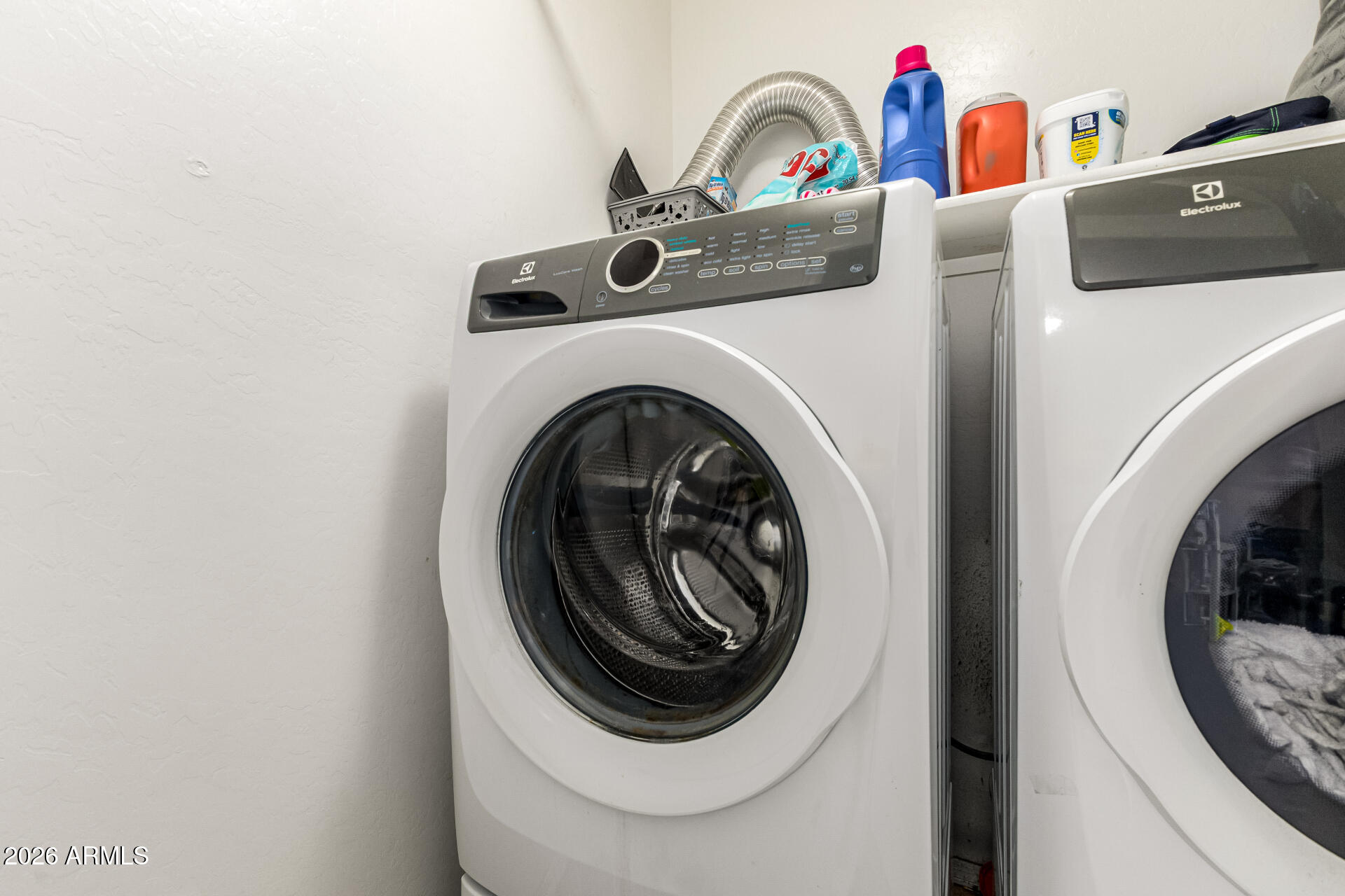 4237 East Orchid Lane Gilbert, AZ 85296 - Photo 29 of 33 a utility room with dryer and washer