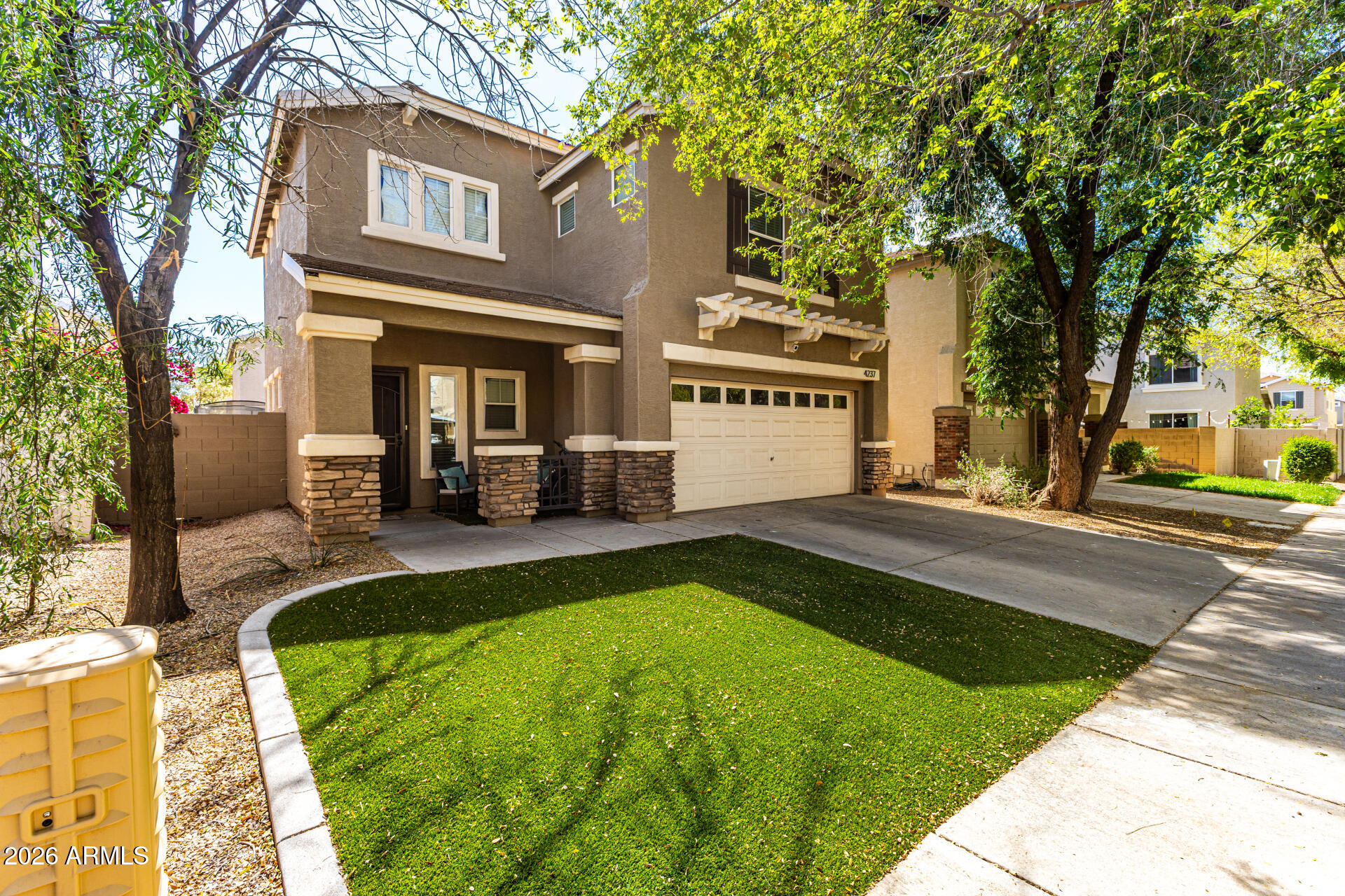 4237 East Orchid Lane Gilbert, AZ 85296 - Photo 3 of 33 a view of a house with a swimming pool