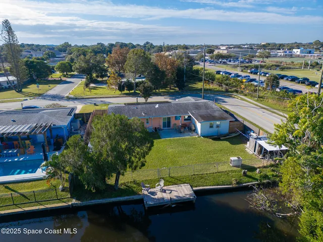 a view of a city with lawn chairs