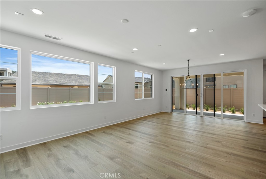 3070 Rue De Latour Vista, CA 92084 - Photo 5 of 22 Large great room, wood floors
