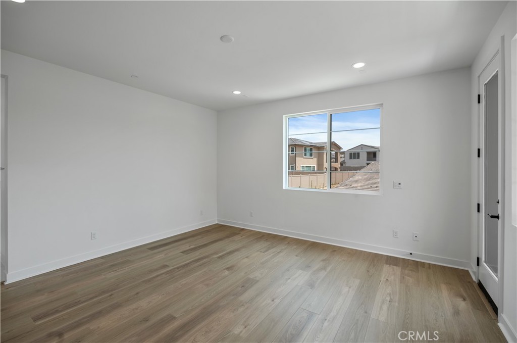 3070 Rue De Latour Vista, CA 92084 - Photo 7 of 22 Large great room, wood floors