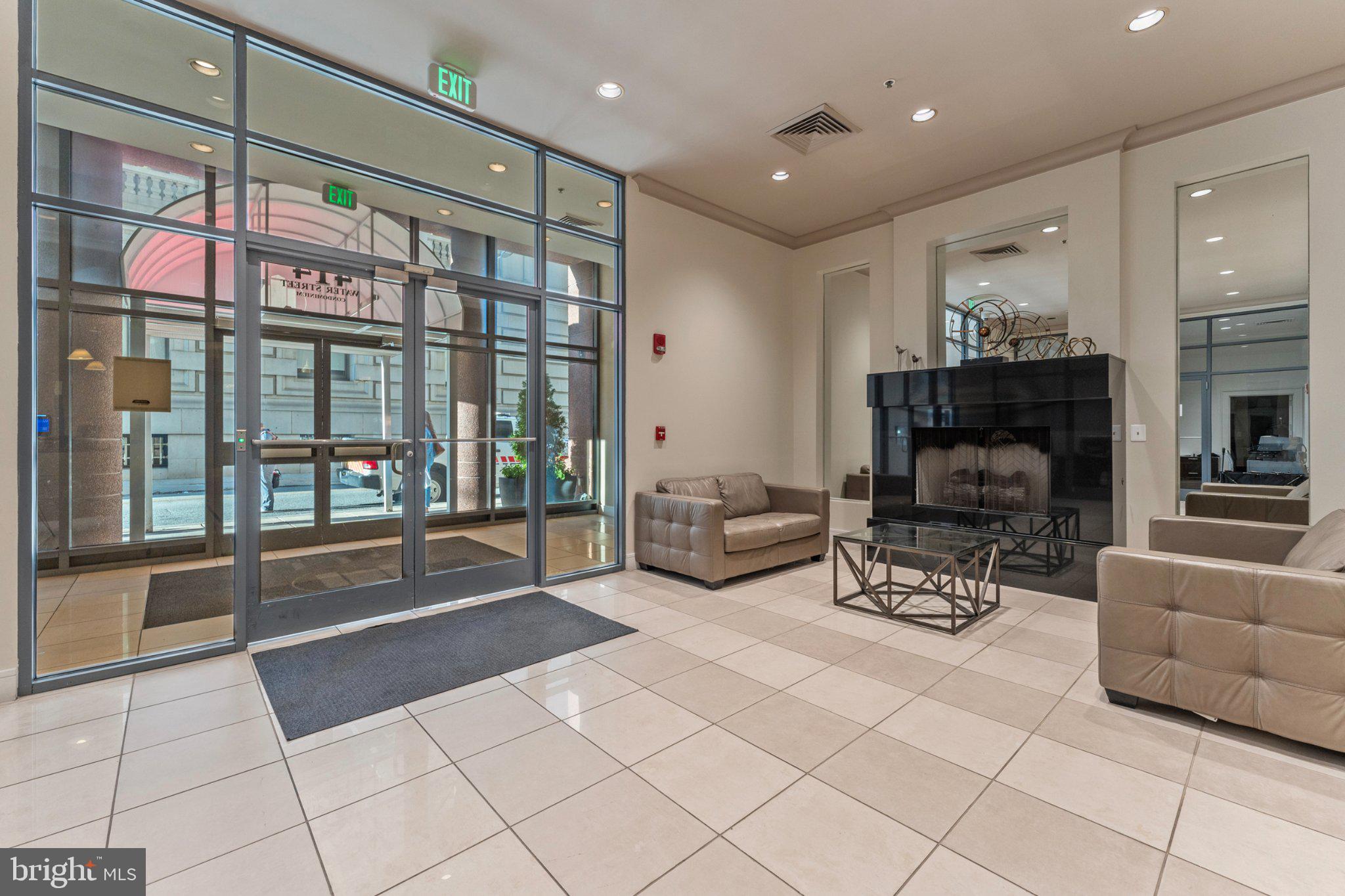 414 Water Street, Unit 1306 Baltimore, MD 21202 - Photo 7 of 29 Modern lobby with sleek design.