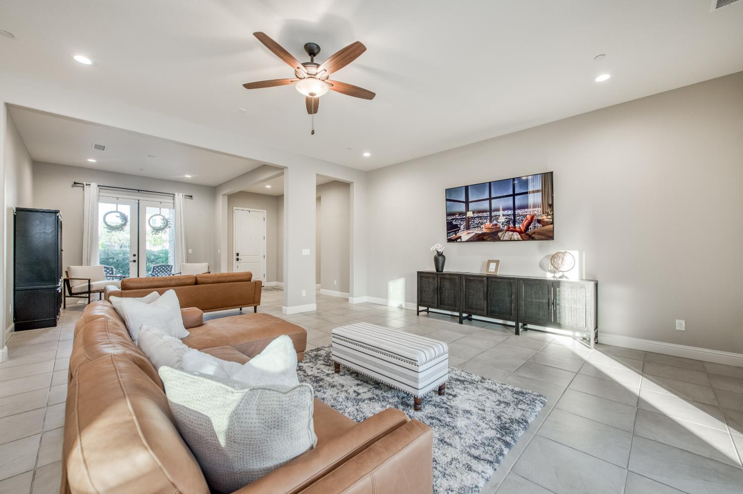 598 Crescent Lane Madera, CA 93636 - Photo 19 of 80 a living room with furniture and a view of kitchen