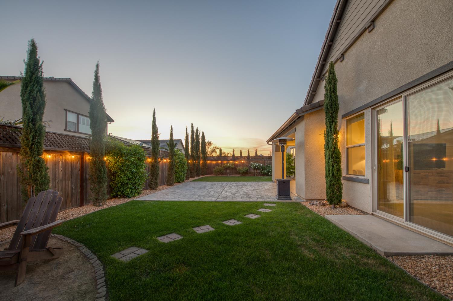 598 Crescent Lane Madera, CA 93636 - Photo 45 of 80 a view of a big room with a big yard and potted plants