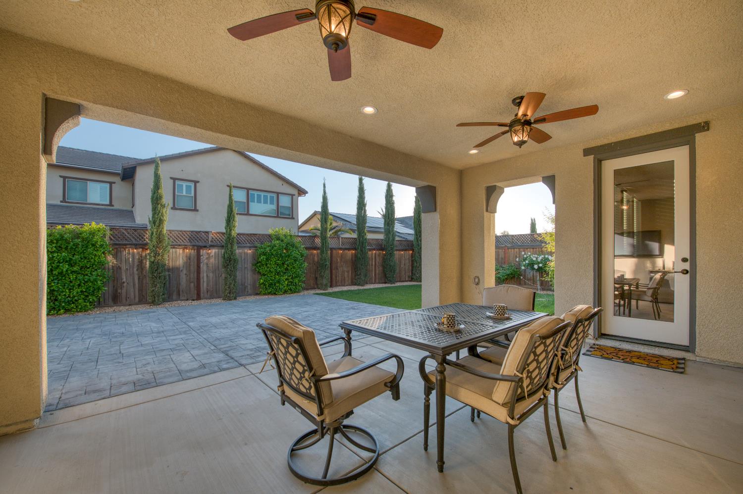 598 Crescent Lane Madera, CA 93636 - Photo 51 of 80 a view of a porch with furniture and a yard