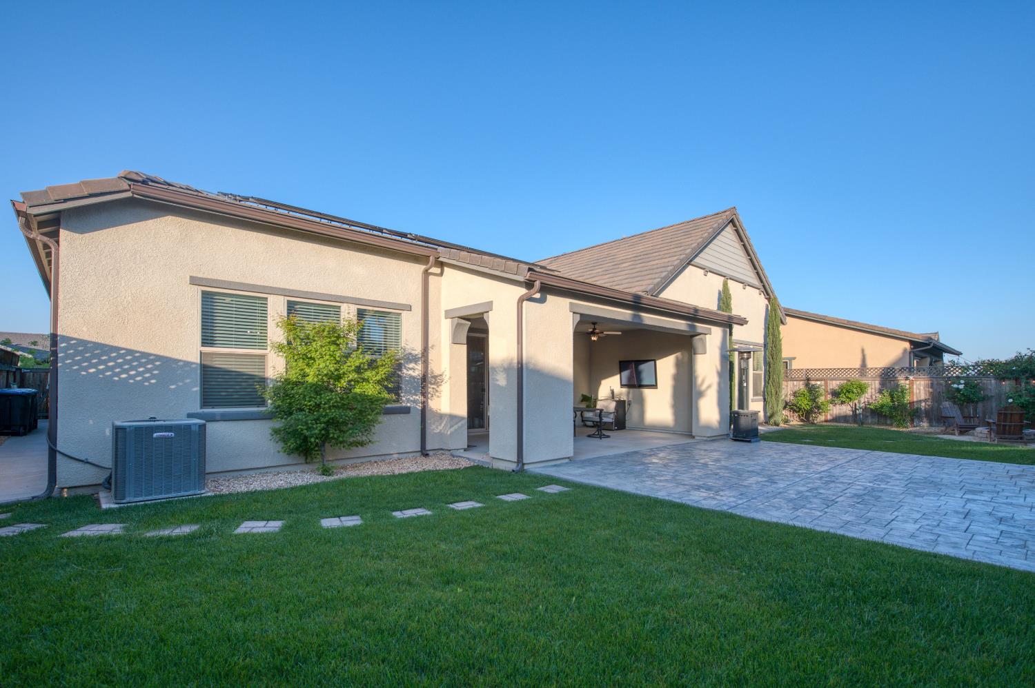 598 Crescent Lane Madera, CA 93636 - Photo 55 of 80 a view of a house with a yard and sitting area