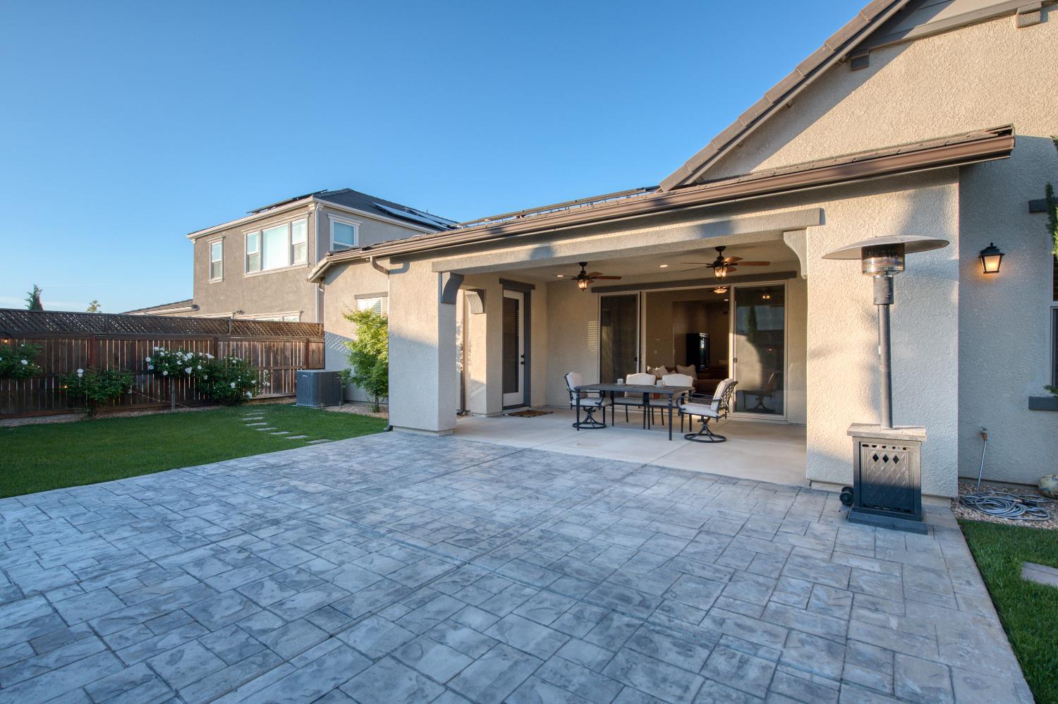 598 Crescent Lane Madera, CA 93636 - Photo 56 of 80 a view of a house with backyard porch and sitting area