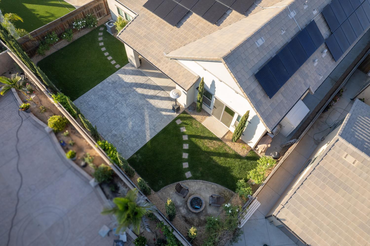 598 Crescent Lane Madera, CA 93636 - Photo 66 of 80 a backyard of a house with outdoor seating