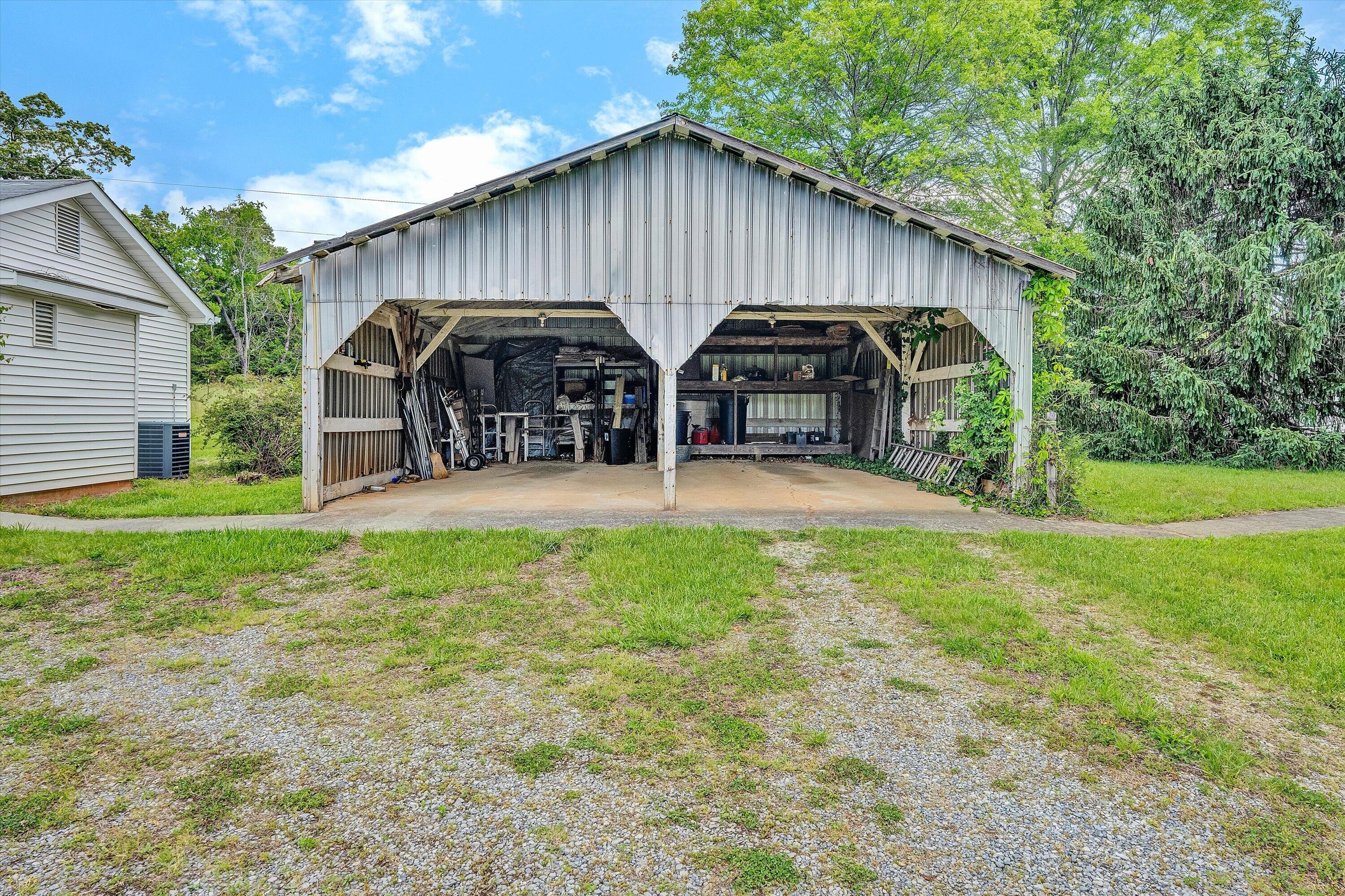 5328 White House Road Moneta, VA 24121 - Photo 33 of 39 a view of a house with yard and a garden