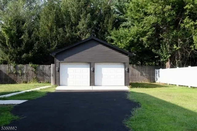 a front view of a house with yard
