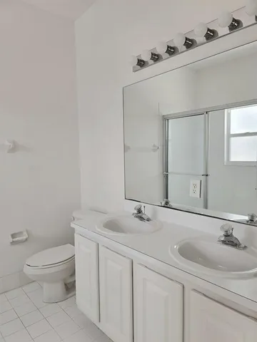 a bathroom with a sink and a toilet