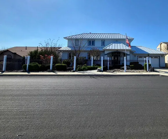a front view of a building and a street