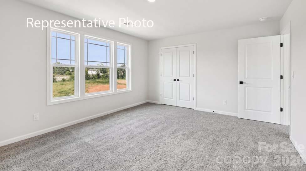7601 Bainbridge Road Sherrills Ford, NC 28673 - Photo 21 of 34 a view of an empty room with a window