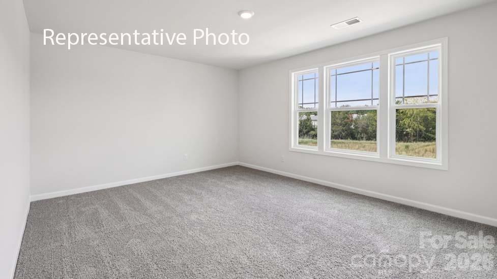 7601 Bainbridge Road Sherrills Ford, NC 28673 - Photo 22 of 34 a view of an empty room with a window