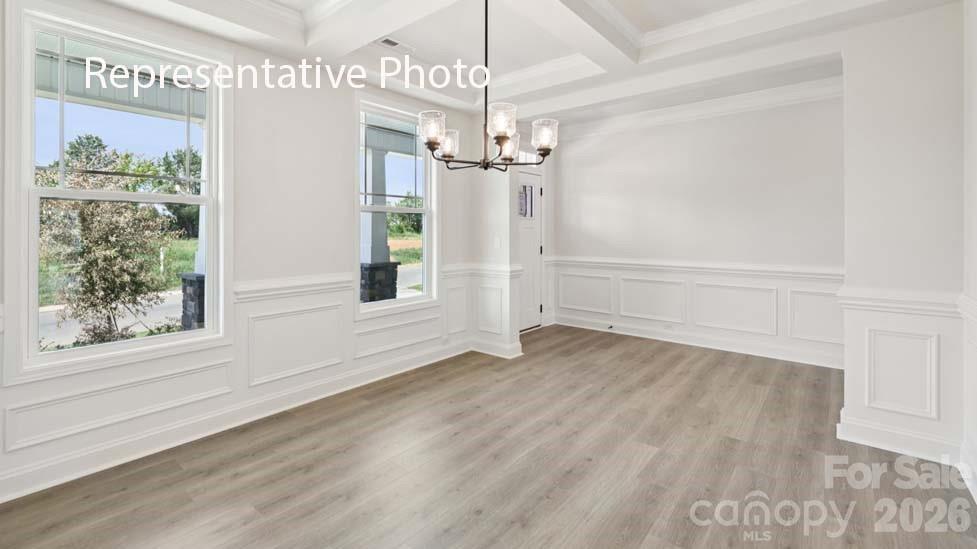 7601 Bainbridge Road Sherrills Ford, NC 28673 - Photo 3 of 34 a view of a chandelier in an empty room