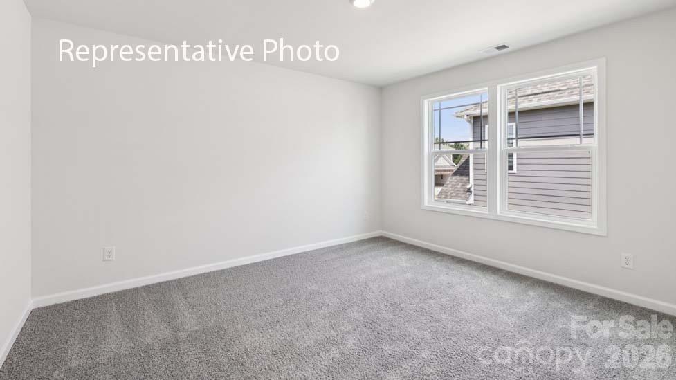 7601 Bainbridge Road Sherrills Ford, NC 28673 - Photo 31 of 34 a view of an empty room with a window