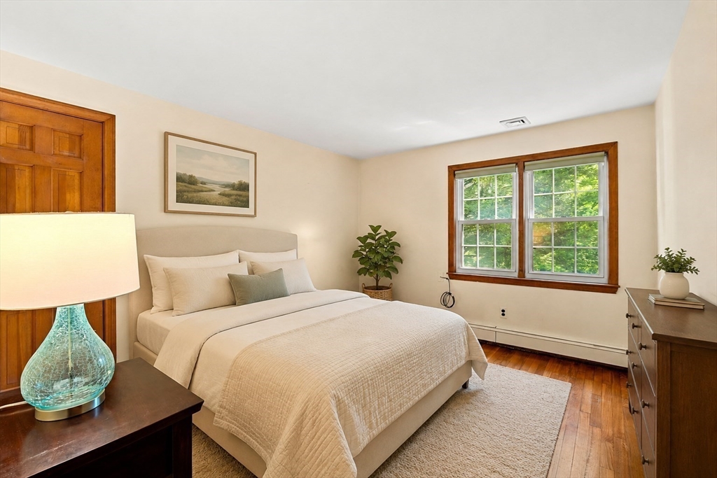 371 Longley Road Groton, MA 01450 - Photo 20 of 33 a bedroom with a bed and a window