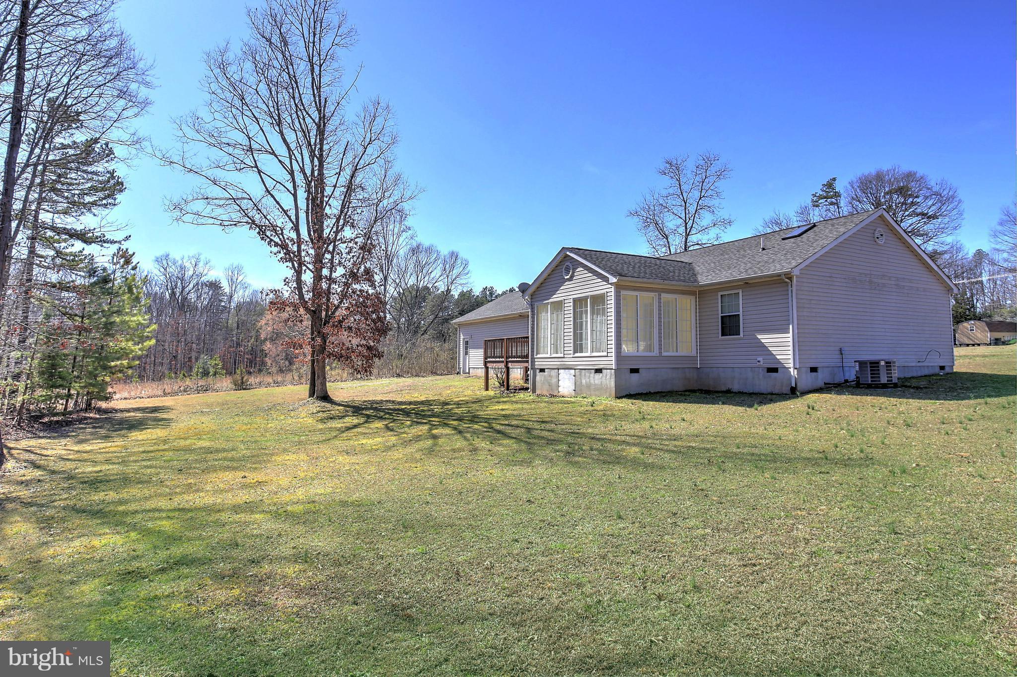180 Spring Road Mineral, VA 23117 - Photo 17 of 22 a view of a house with a yard
