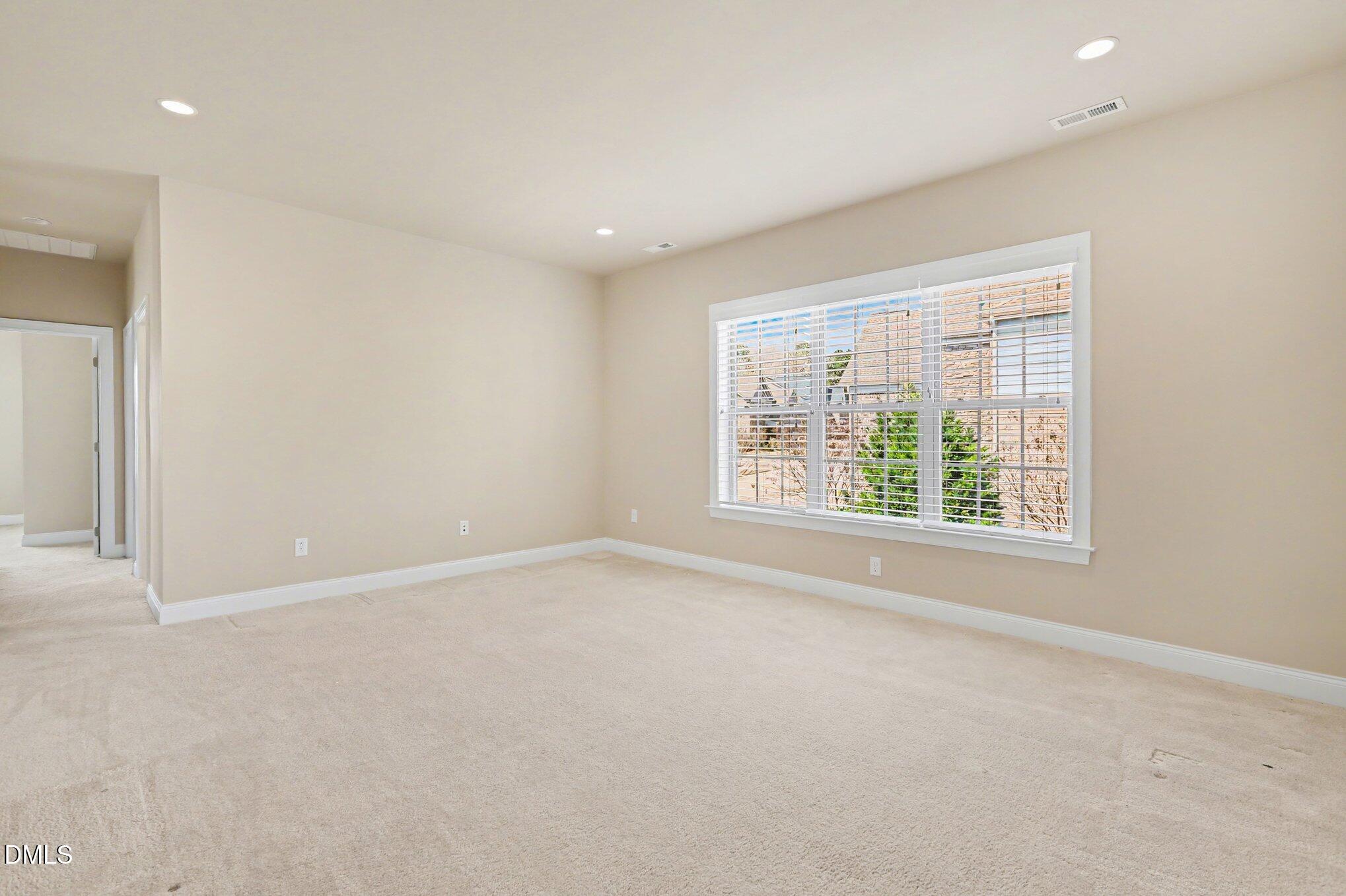 351 Gartrell Way Cary, NC 27519 - Photo 29 of 51 an empty room with windows
