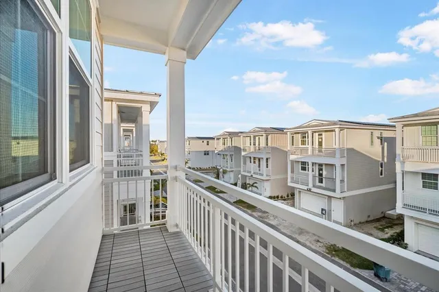 a view of a balcony with city view