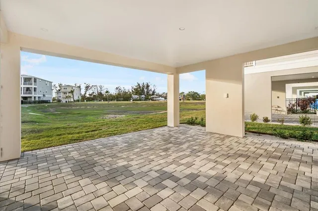 a view of a living room and a floor to ceiling window