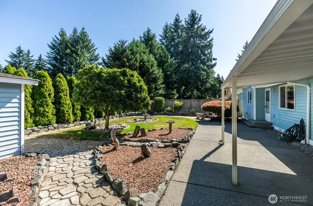 a view of a swimming pool with a patio