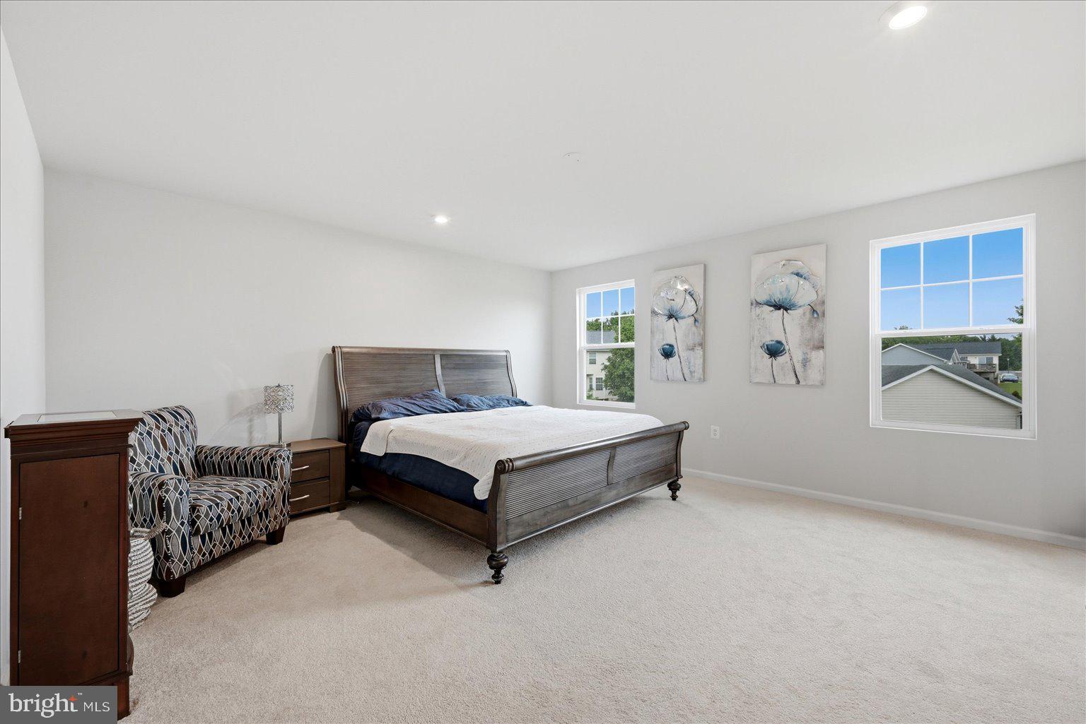 359 National Street Ranson, WV 25438 - Photo 35 of 58 a spacious bedroom with a bed and window
