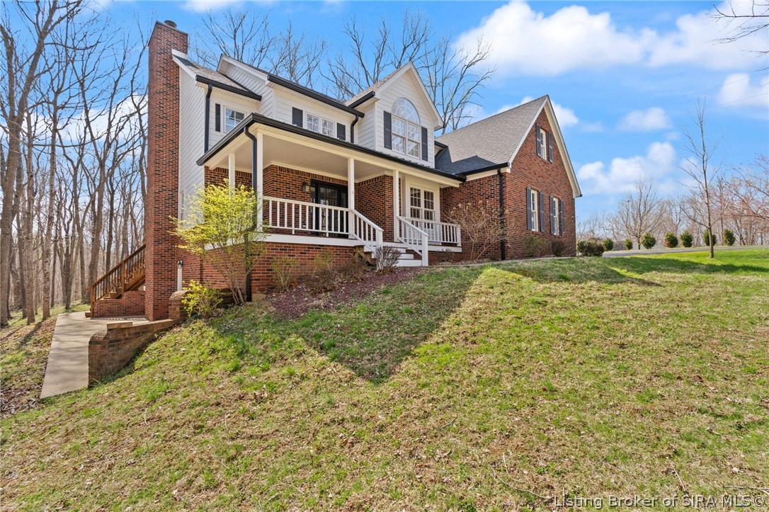 5320 Buttontown Road Georgetown, IN 47122 - Photo 6 of 69 Side walkout with enormous concrete patio