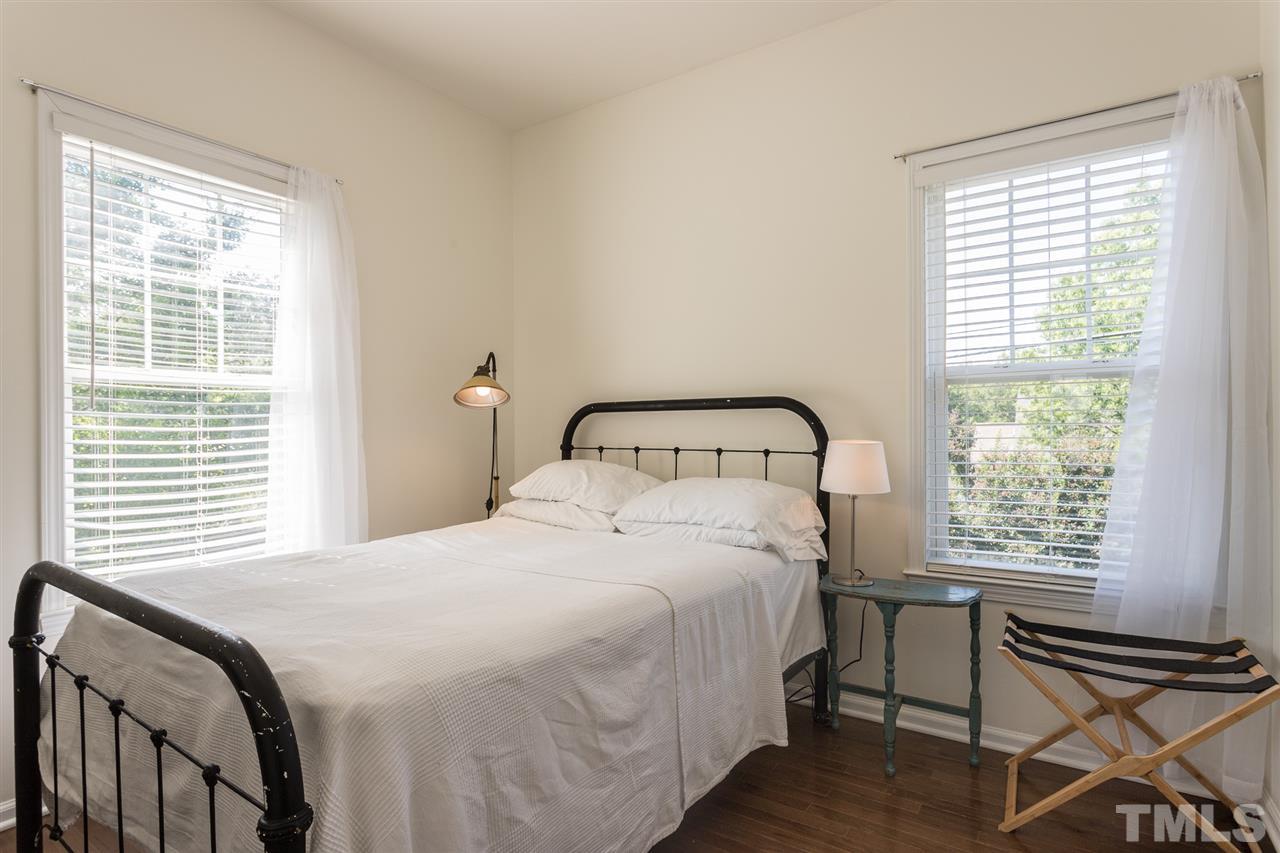 233 Cooke Street Raleigh, NC 27601 - Photo 19 of 27 Secondary bedroom. All rooms in this home are bathed in natural light.