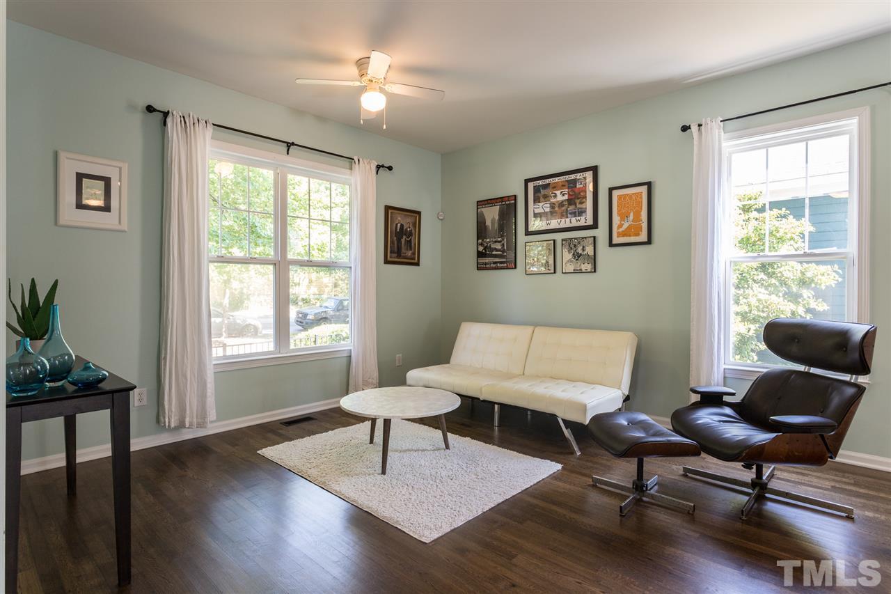 233 Cooke Street Raleigh, NC 27601 - Photo 26 of 27 Inside, your open floor plan and newly refinished hardwoods await, as do 9 foot ceilings and rooms bathed in natural light