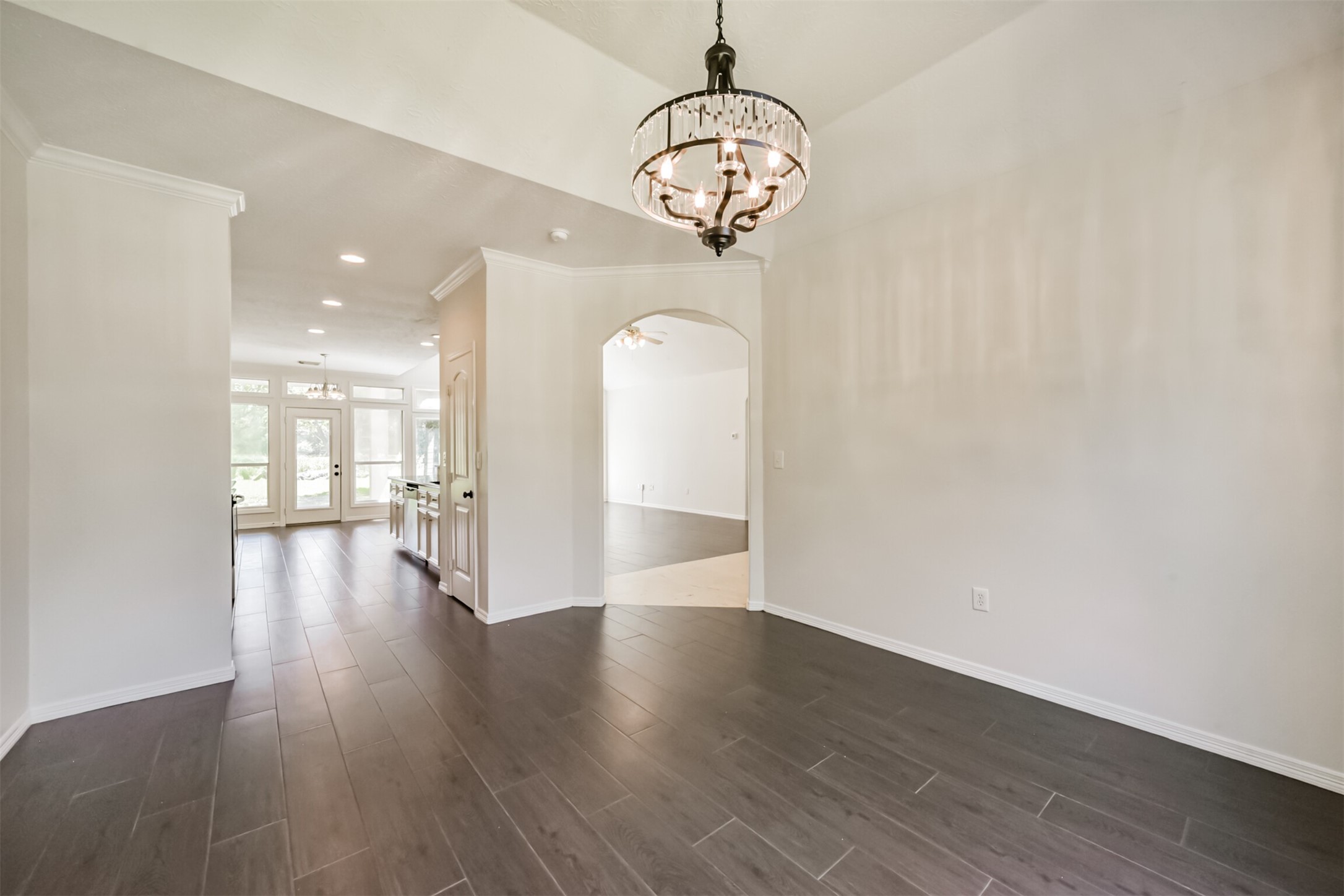 27322 Afton Way Huffman, TX 77336 - Photo 33 of 50 Open dining space seamlessly connects to the kitchen and living areas, creating an ideal flow for entertaining.