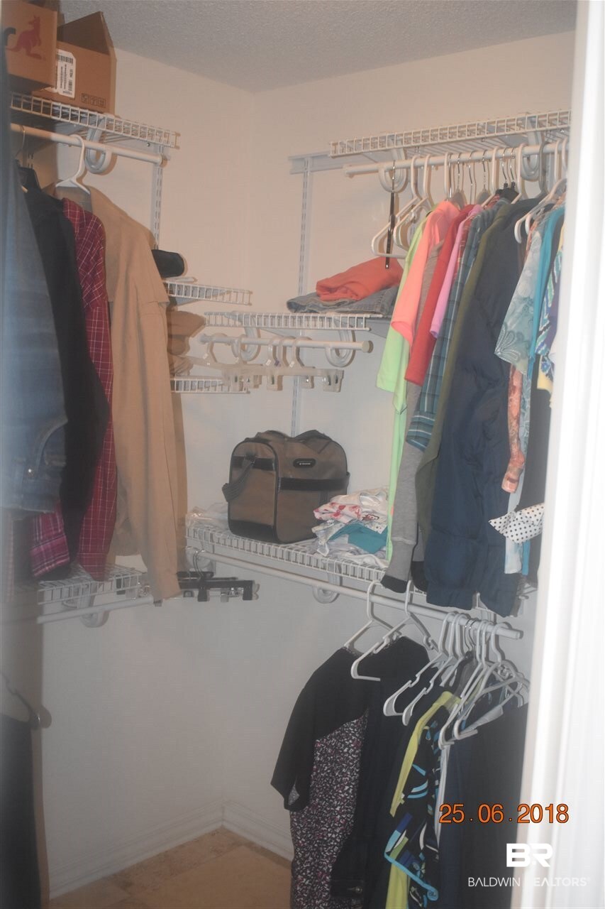 314 Monteith Oaks Drive Foley, AL 36535 - Photo 19 of 31 master bedroom closet