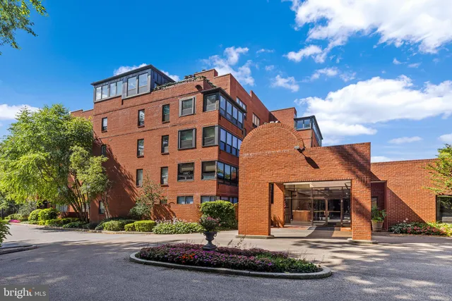 a kitchen with stainless steel appliances granite countertop a stove and a refrigerator