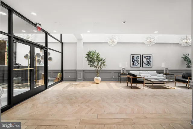 a kitchen with kitchen island granite countertop wooden cabinets and stainless steel appliances