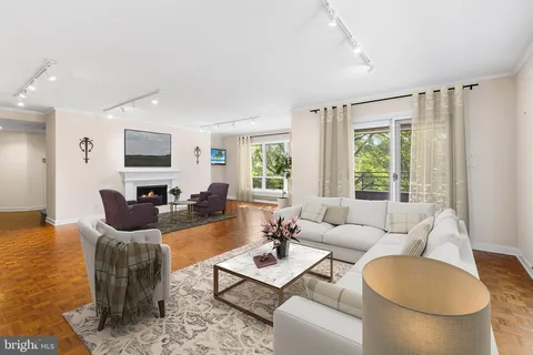 a utility room with sink dryer and washer