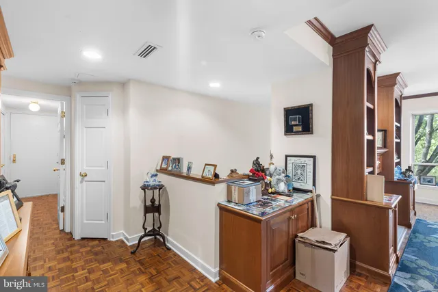 a bed room with a bed and a chair