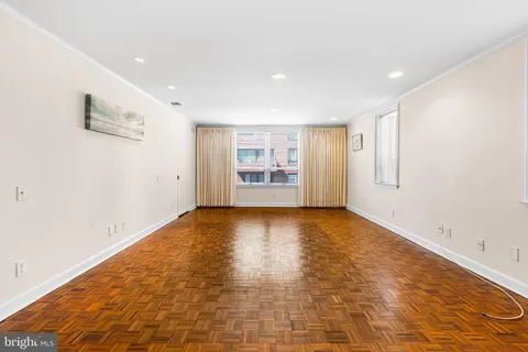 a bathroom with a granite countertop sink mirror and double