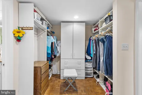 a view of a car parked in front of a building