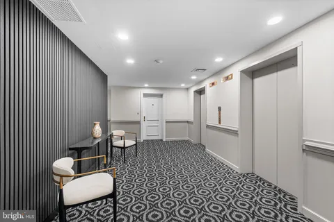 a bathroom with a tub and shower